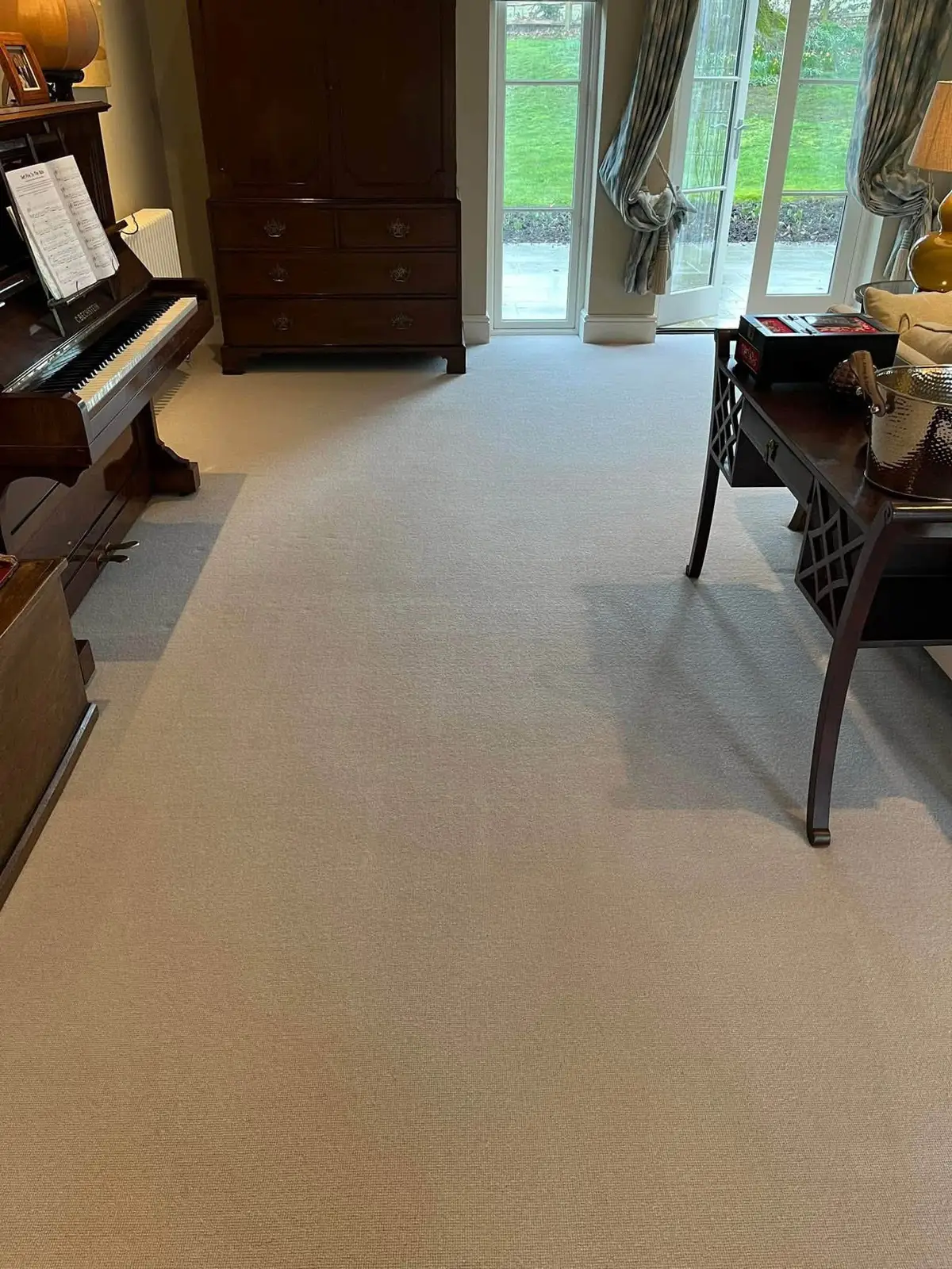 Bedroom carpet drying with air movers after a clean