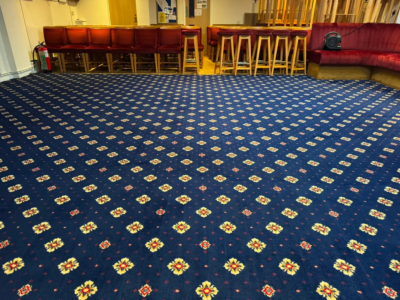 Large community hall carpet after cleaning